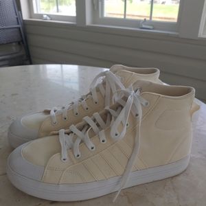 Adidas high top canvas sneaker women's 11, pale yellow